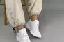 Кросівки жіночі шкіряні білого кольору Фото 3