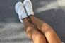 Кросівки жіночі шкіряні білого кольору Фото 17
