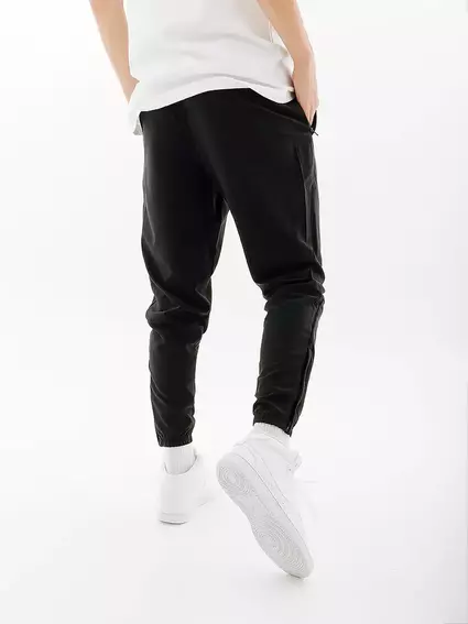 Брюки Nike M NK ESSENTIAL WOVEN PANT BV4833-010 фото 2 — интернет-магазин Tapok