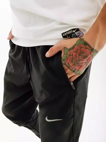 Брюки Nike M NK ESSENTIAL WOVEN PANT BV4833-010 фото 3 — интернет-магазин Tapok