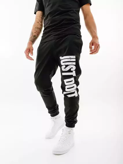 Брюки Nike M NK DNA WOVEN PANT SSNL DX3565-010 фото 1 — интернет-магазин Tapok