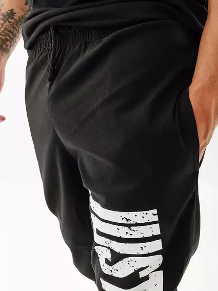 Штани Nike M NK DNA WOVEN PANT SSNL DX3565-010 фото 3 — інтернет-магазин Tapok