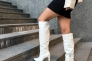 Сапоги женские кожаные молочного цвета на каблуках демисезонные Фото 16