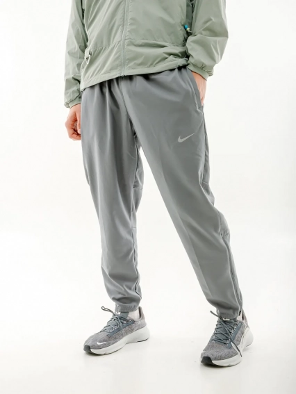 Штани Nike CHLLGR WVN PANT DD4894-084 фото 1 — інтернет-магазин Tapok