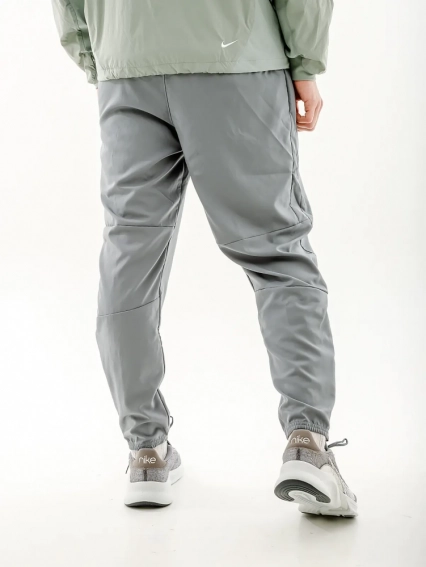 Брюки Nike CHLLGR WVN PANT DD4894-084 фото 2 — интернет-магазин Tapok