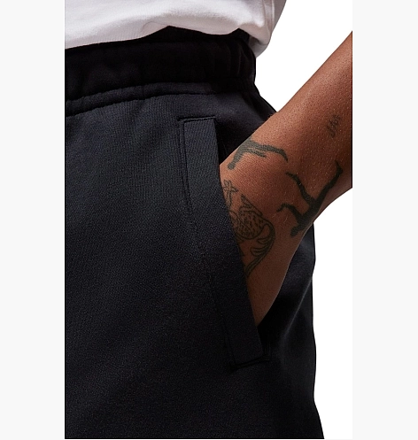 Чоловічі штани NIKE M JORDAN ESS FLC BASELINE PANT FD7345-010 фото 4 — інтернет-магазин Tapok