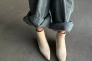 Ботинки казаки женские замшевые кремового цвета Фото 15