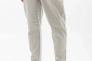 Брюки Nike CLUB TAPER LEG PANT DX0623-077 Фото 1