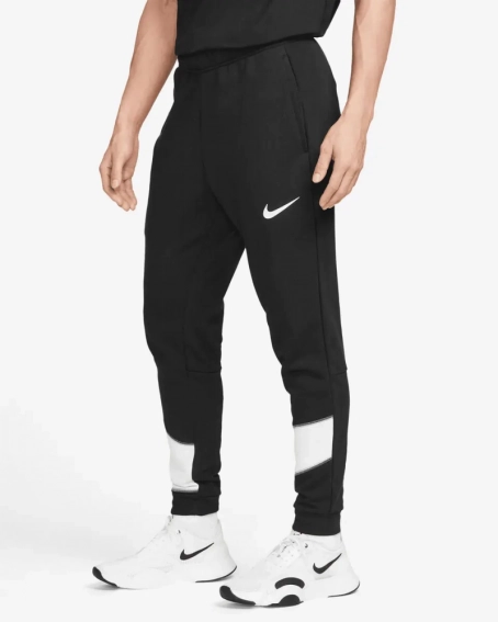 Брюки мужские Nike M Dri Fit Men Tapered (FB8577-010) фото 1 — интернет-магазин Tapok