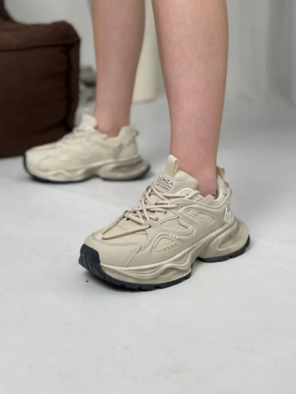 Кросівки жіночі шкіряні молочного кольору фото 1 — інтернет-магазин Tapok