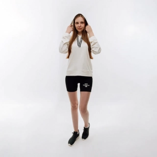 Женские Шорты New Balance Essentials Reimagined Arch. Черный