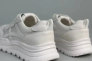 Кросівки жіночі шкіряні білого кольору зі вставками сітки Фото 10