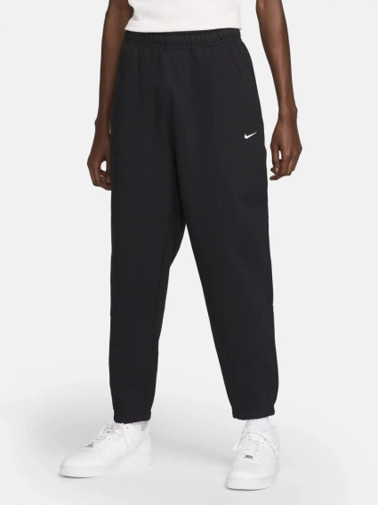 Брюки Nike Solo Swoosh Fleece Joggers (DX1364-010) DX1364-010 фото 1 — интернет-магазин Tapok