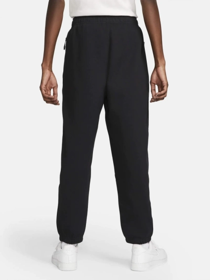 Брюки Nike Solo Swoosh Fleece Joggers (DX1364-010) DX1364-010 фото 2 — интернет-магазин Tapok