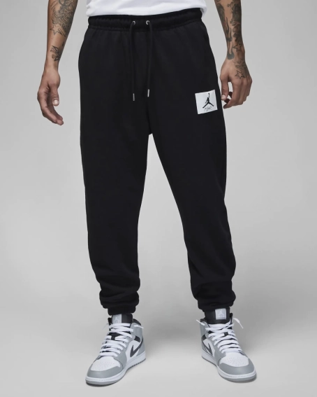 Брюки JORDAN MJ ESS STMT FLC PANT DQ7468-010 фото 1 — интернет-магазин Tapok