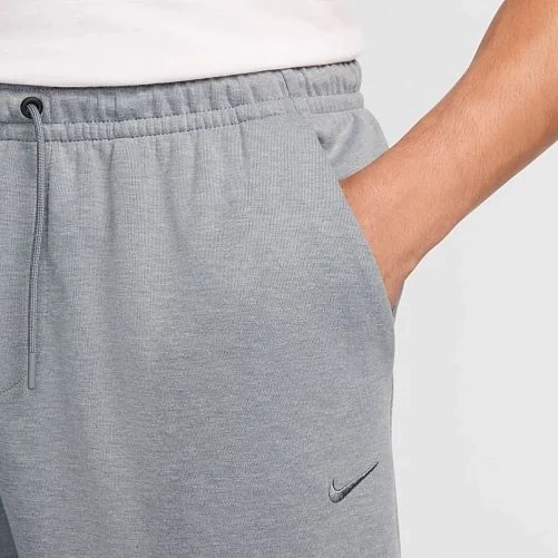 Брюки Nike Primary Dri-Fit Uv Versatile Joggers Grey FZ0975-065 L FZ0975-065 фото 3 — интернет-магазин Tapok