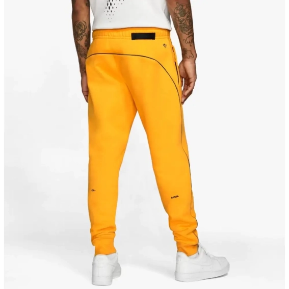 Брюки Nocta Drake x NIKE NOCTA AU Essential Fleece Pant Yellow DA3935-739 фото 3 — интернет-магазин Tapok
