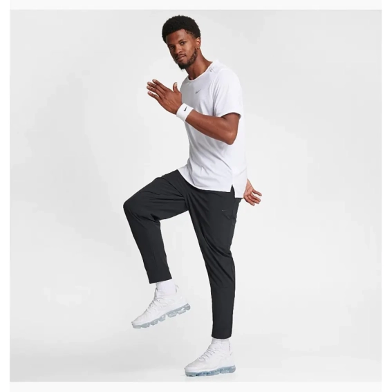 Брюки мужские Nike Dri-Fit Unlimited Tapered Leg Versatile Training Pants FB7548-010 фото 4 — интернет-магазин Tapok