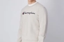 Толстовка CREWNECK SWEATSHIRT 220254-ES057 Champion L Бежевий 220254-ES057 Фото 1