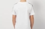 Футболка підліткова ESS TAPE Tee 68578002 Puma 128 Білий 68578002 Фото 2