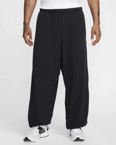 Брюки чоловічі Nike Oversized French Terry (HJ1822-010) фото 1 — інтернет-магазин Tapok