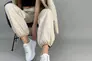 Кросівки жіночі шкіряні білого кольору Фото 9