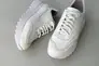 Кросівки жіночі шкіряні білого кольору Фото 12