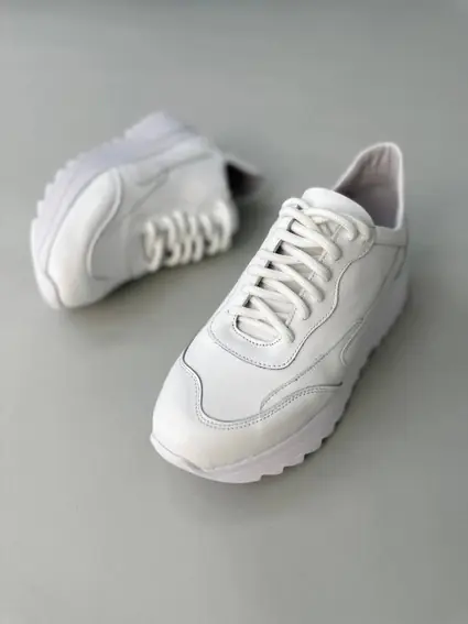 Кросівки жіночі шкіряні білого кольору фото 13 — інтернет-магазин Tapok