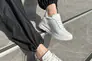 Кросівки жіночі шкіра флотар білого кольору з перфорацією на товстій підошві Фото 4