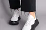 Кросівки жіночі шкіряні білі з чорними вставками Фото 2
