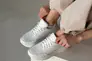 Кросівки жіночі шкіряні білі на білій підошві Фото 3