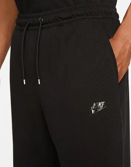 Брюки чоловічі Nike Lightweight Open Hem Trousers (DM6591-010) фото 2 — інтернет-магазин Tapok