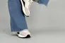 Кросівки жіночі з нейлону білого кольору зі вставками шкіри та нубука Фото 4