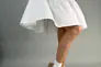 Босоніжки жіночі шкіряні бежевого кольору стьобані Фото 4