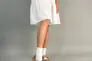 Босоніжки жіночі шкіряні бежевого кольору стьобані Фото 6