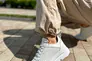 Кросівки жіночі шкіряні білі з перфорацією Фото 4