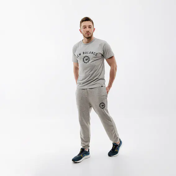 Брюки New Balance Sport Seasonal MP31902AG фото 1 — интернет-магазин Tapok