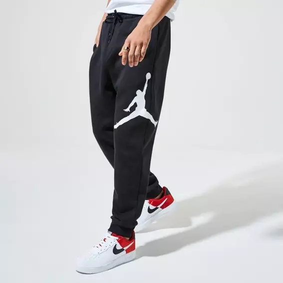 Мужские брюки NIKE MJ JUMPMAN LOGO FLC PANT BQ8646-010 фото 1 — интернет-магазин Tapok